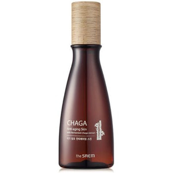 SAEM CHAGA Anti-aging Skin Флюид антивозрастной с экстрактом чаги, 160 мл. SAEM CHAGA Anti-aging Skin Флюид антивозрастной с экстрактом чаги, 160 мл.КОРЕЙСКАЯ КОСМЕТИКА<br>Антивозрастной ферментированный тоник для лица с экстрактом гриба чаги. Линия на основе чаги интенсивно защищает и заботится о возрастной коже лица и шеи. Придает коже мягкость и гладкость, улучшает ее текстуру и замедляет процессы старения. Содержит сбалансированный комплекс активных ингредиентов, защищающих от обезвоживания. Ниацинамид убирает серость уставшей кожи, предотвращает пигментные отложения и очищает от мертвых клеток, что способствует проникновению питательных веществ в глубокие слои эпидермиса и восстановлению чистого светлого тона. С Chaga Anti-aging Skin жизненные силы Вашей кожи восполнятся за короткое время, после чего она станет здоровой сияющей и упругой. Применение: нанесите небольшое количество тоника на ватный диск и мягко протрите кожу лица.<br>